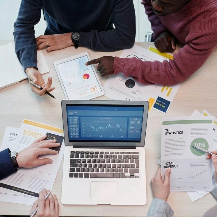 A team collaborating on financial data across devices